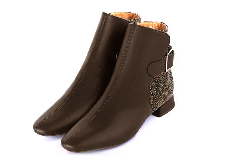 Dark brown women's ankle boots with buckles at the back. Square toe. Flat flare heels. Front view - Florence KOOIJMAN